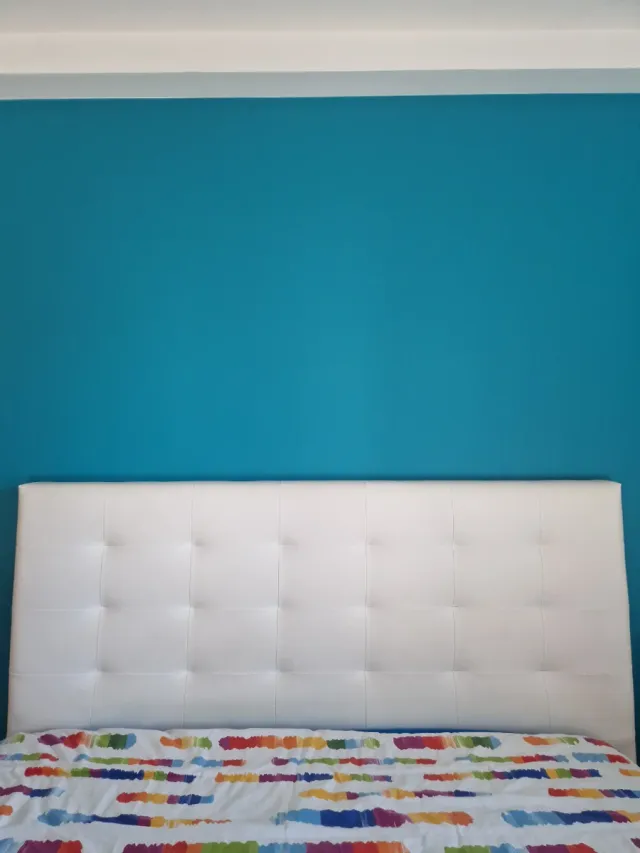 Cabezal de cama blanco capitoné