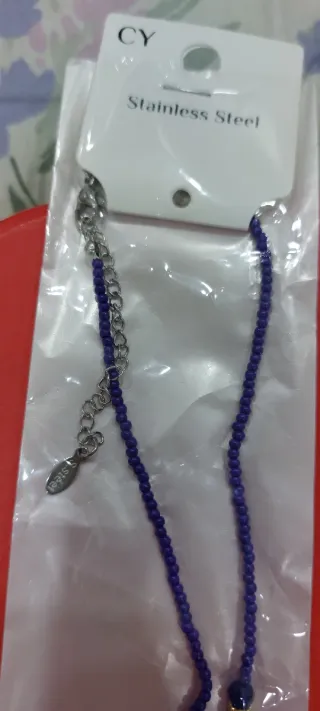 Collana donna con occhio blu e dettagli oro