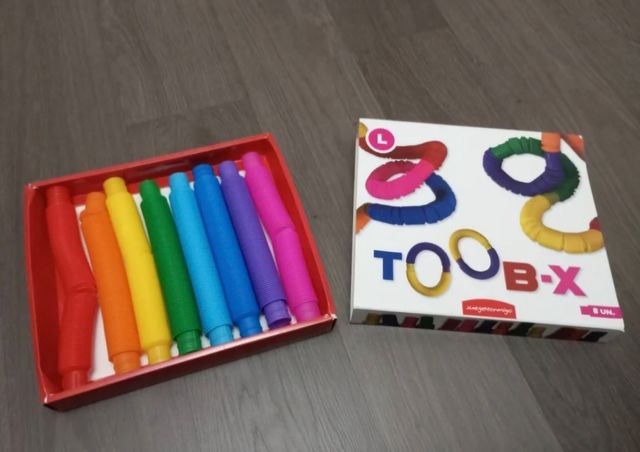 Juguetes Tubo Pop Colores Arcoíris (8 Unidades)