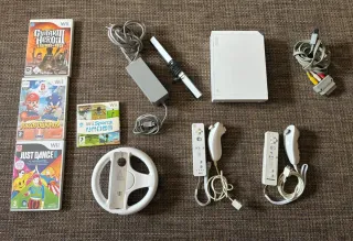 Nintendo Wii + 2 mandos + 4 juegos
