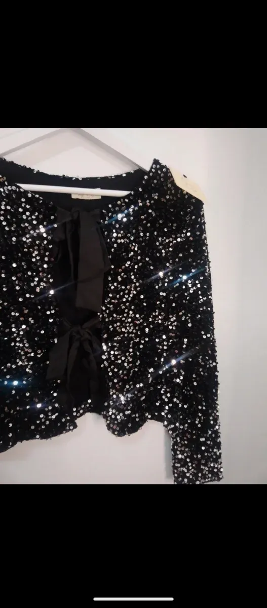 Chaqueta lentejuelas negra y plateada
