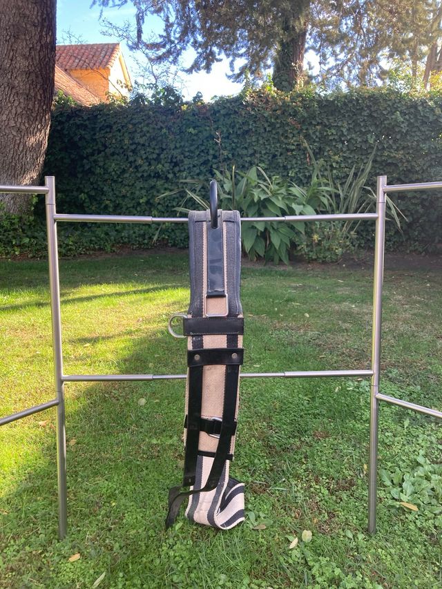 Cinturón de volteo con una sola empuñadura