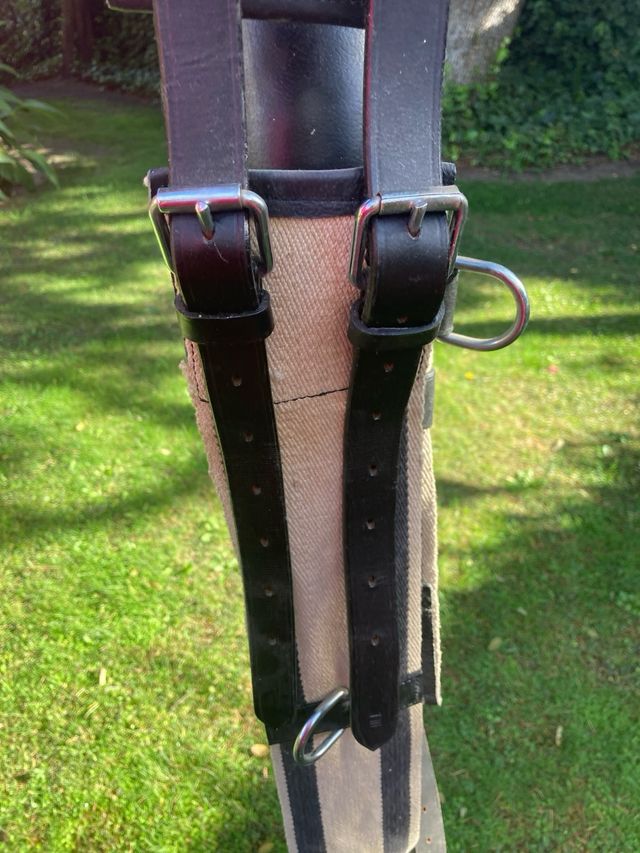 Cinturón de volteo con una sola empuñadura