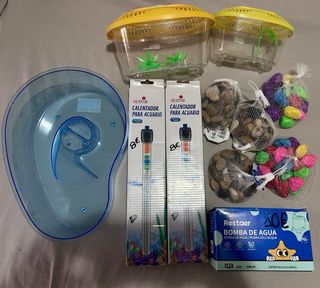 Accessori per acquari: riscaldatori, pompe e decorazioni