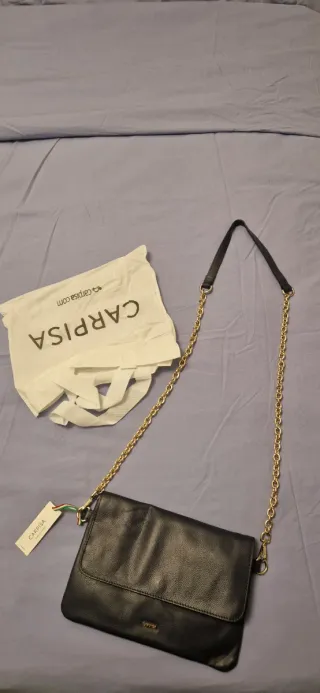 Borsa Carpisa blu con tracolla dorata