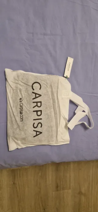Borsa Carpisa blu con tracolla dorata