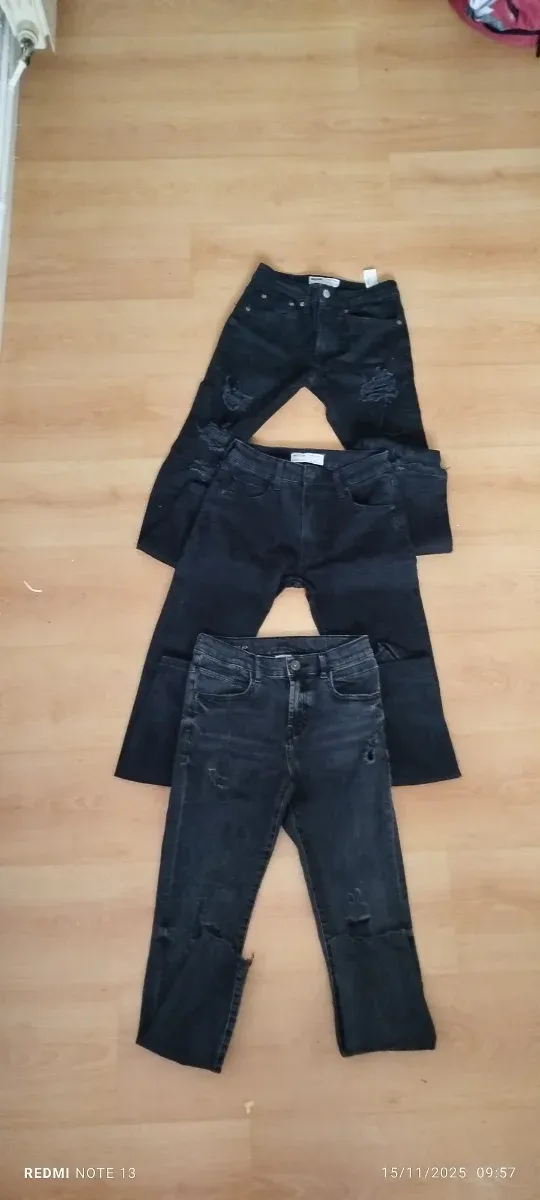 Pantalones vaqueros negros Bershka y Zara