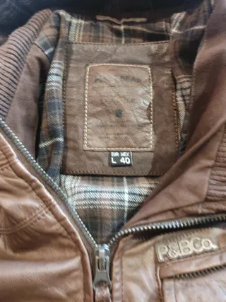 Cazadora bomber cuero hombre con capucha