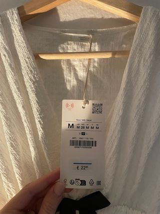 Top Zara blanco con lazo negro Talla M