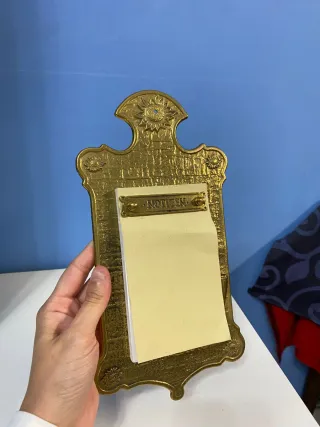 Bloc de notas antiguo en ottone