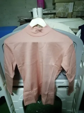 Jersey cuello alto rosa mujer