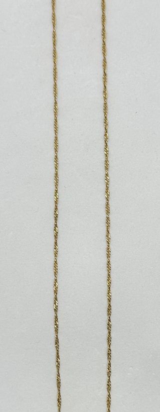 Cadena Singapour de oro de 18k, 2.27 g, 46 cm.