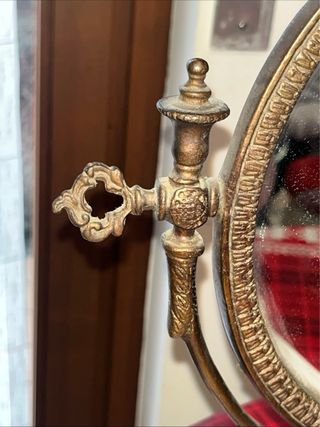 Specchio in ottone decorato