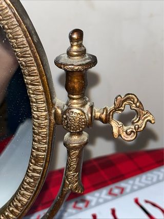 Specchio in ottone decorato