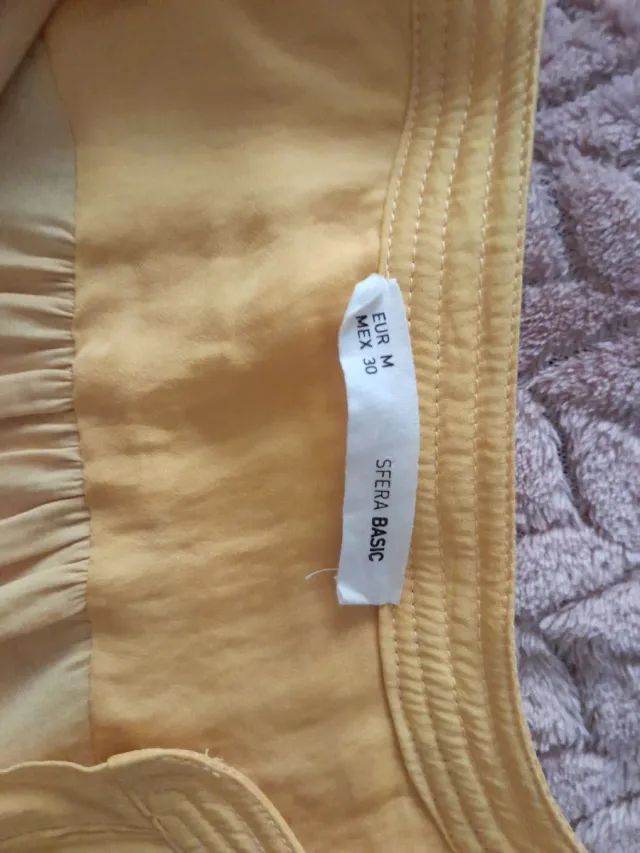 Camisa sin mangas amarilla