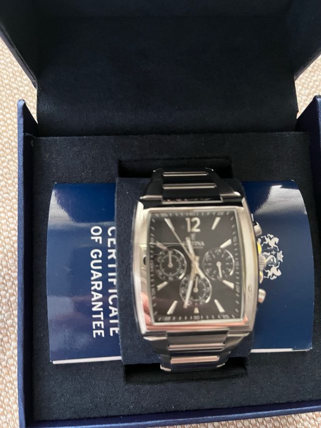 Precioso Reloj Festina Cronógrafo Plateado.