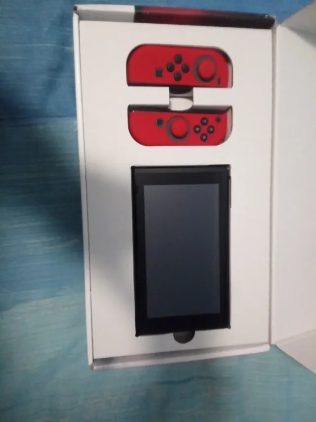 Nintendo Switch Gris y Negro con sus embalajes