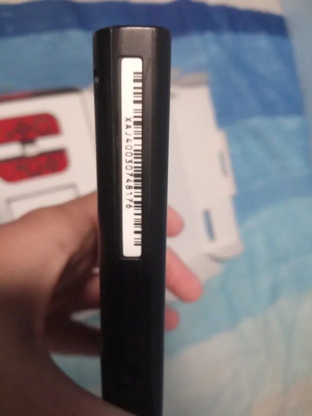 Nintendo Switch Gris y Negro con sus embalajes