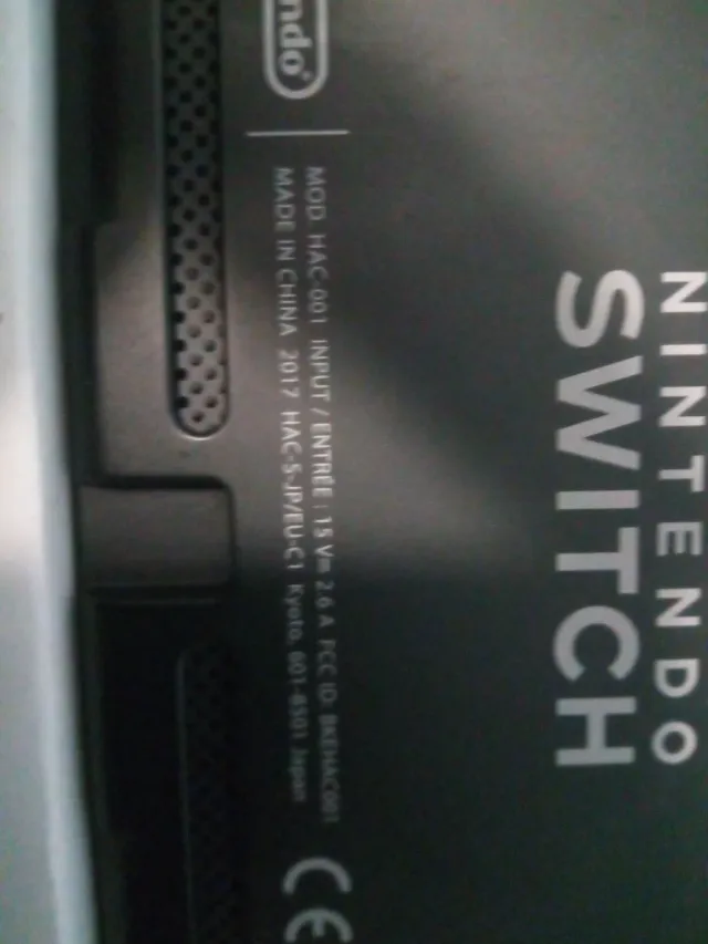 Nintendo Switch Gris y Negro con sus embalajes