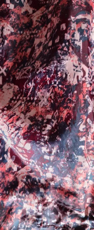 Chubasquero estampado rosa y morado