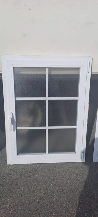 4 ventanas abatibles de aluminio con barrotillos