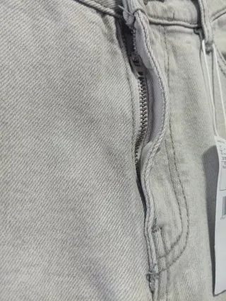 Pantalón flare crop Mango gris