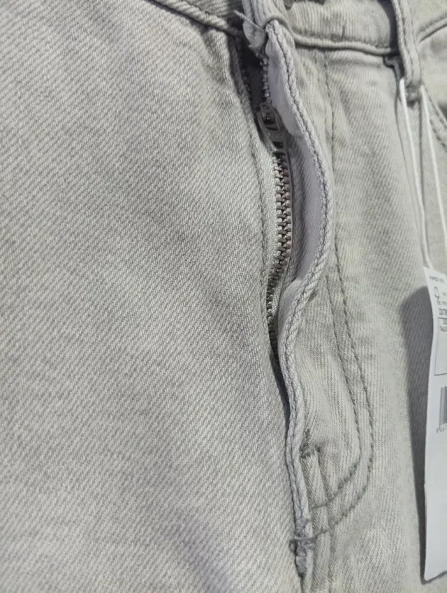 Pantalón flare crop Mango gris