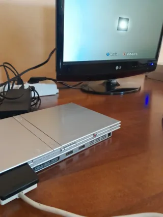 Playstation 2 slim Silver *leggi*