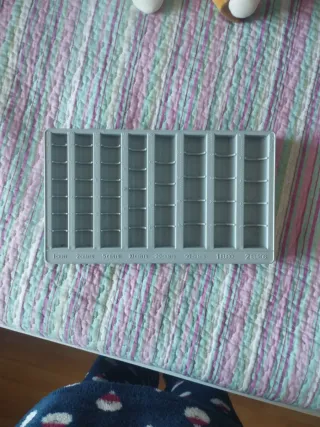 Bandeja clasificadora de monedas