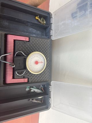 Caña de pescar y maleta