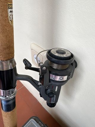 Caña de pescar y maleta