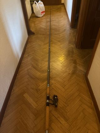 Caña de pescar y maleta