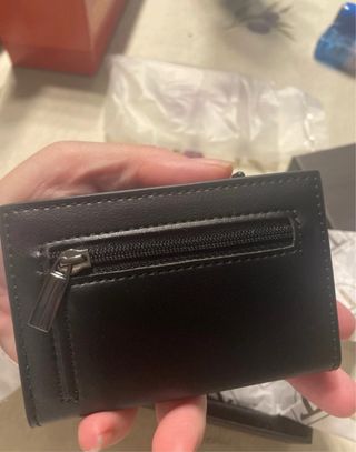 Cartera de caballero de piel negra