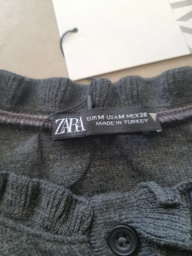 Chaleco Zara punto volantes gris