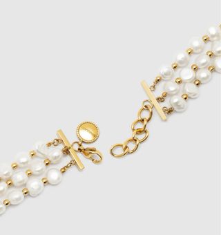 Pulsera de Perlas y cadena dorada