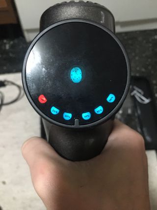 Pistola massaggiante nera con custodia