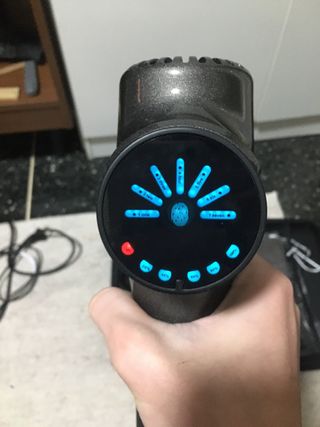 Pistola massaggiante nera con custodia