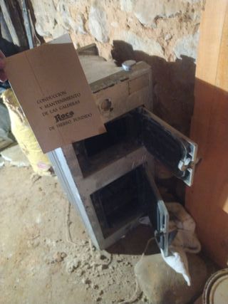 CALDERA DE LEÑA ROCA DE HIERRO FUNDIDO.