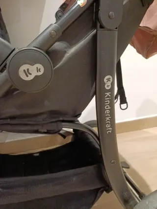 Cochecito de bebé rosa y negro