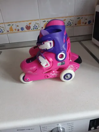 Patines con protecciones.