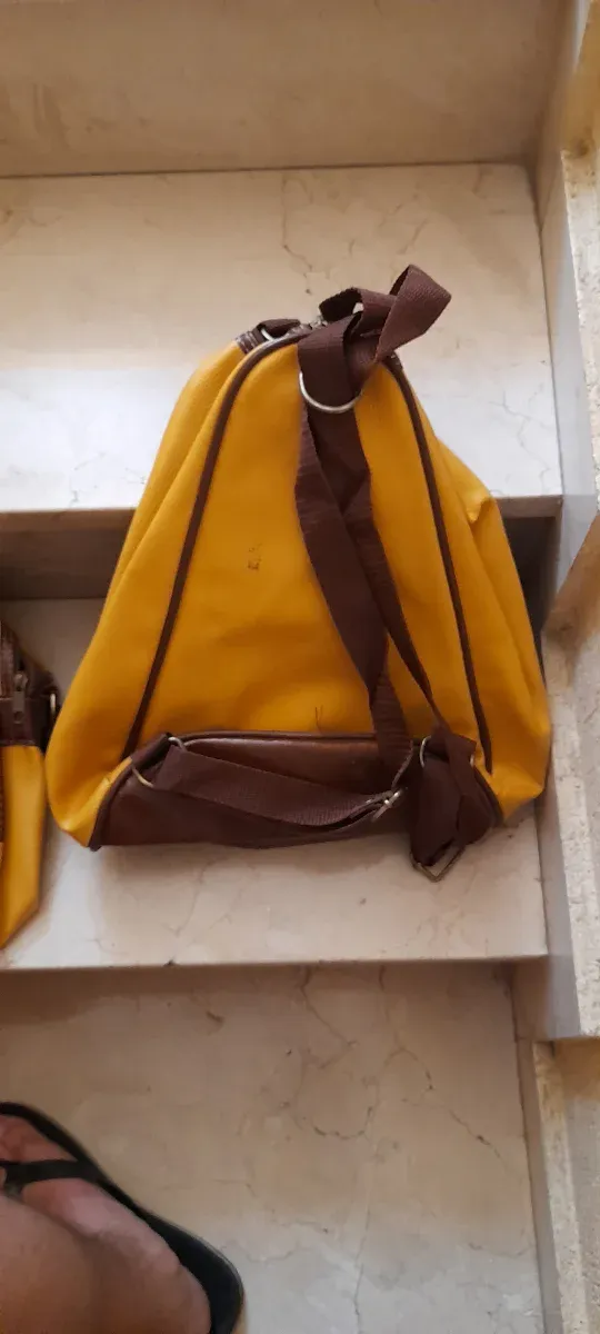 Bolso de viaje vintage amarillo y marrón