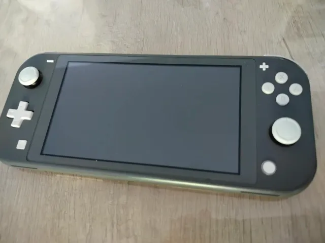 Nintendo Switch Lite Grigio + 2 giochi.