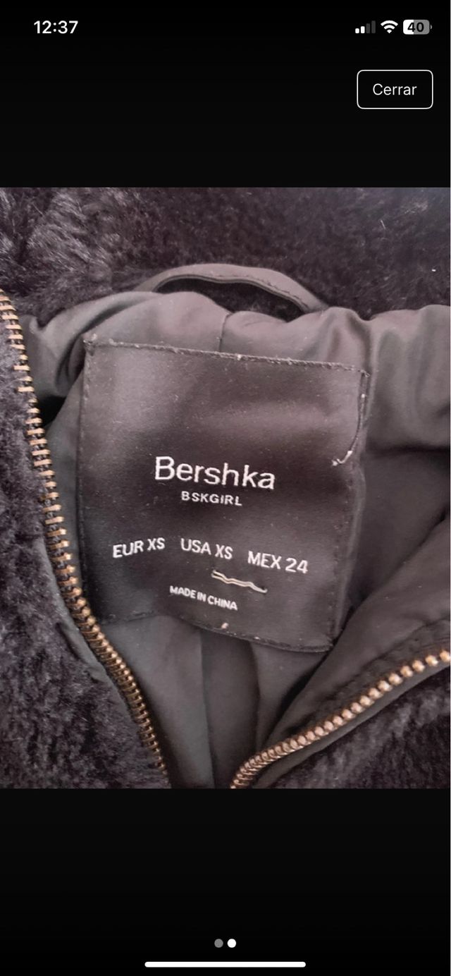 Chaqueta pelo negra con capucha