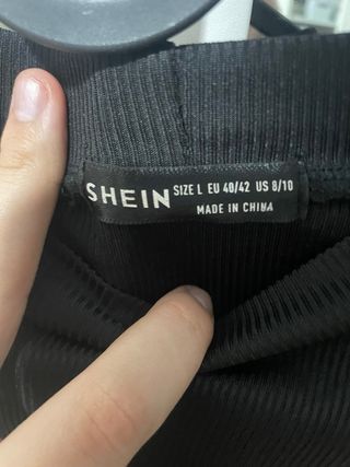 Top negro con transparencias