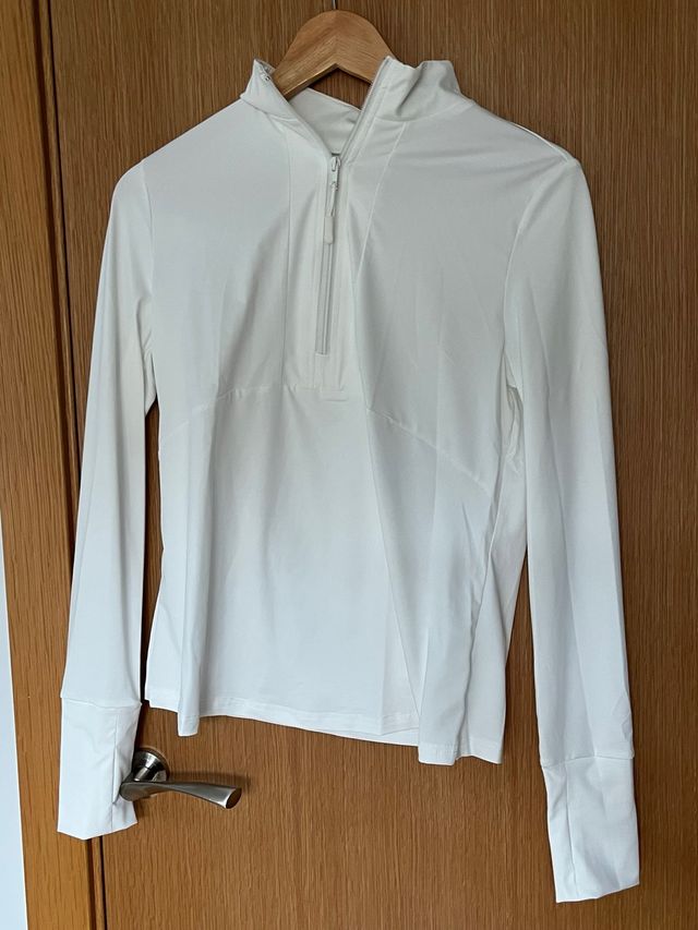 Sudadera deportiva blanca con cremallera