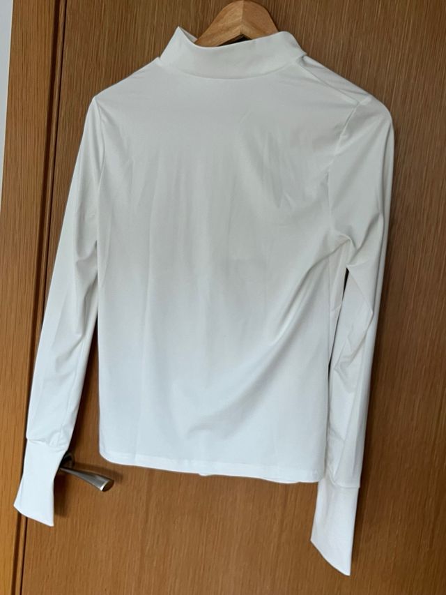 Sudadera deportiva blanca con cremallera