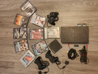 PS2 Slim Negra + tarjetas + 3 mandos + 9 Juegos