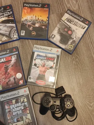 PS2 Slim Negra + tarjetas + 3 mandos + 9 Juegos