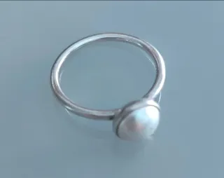 Anillo Pandora con perla