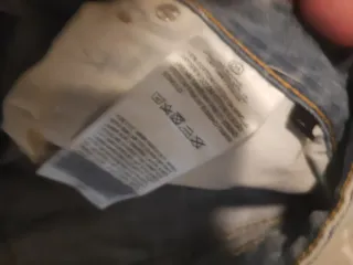 Bermuda vaquera hombre desgastada